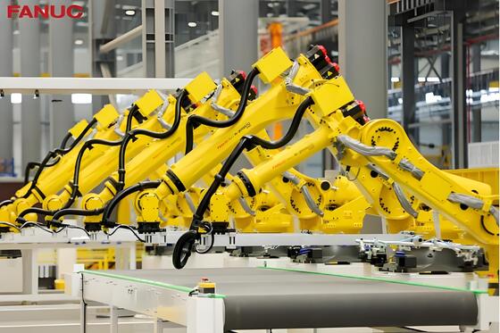 เซลล์ตัดเลเซอร์ FANUC พร้อมการบรรจุ / ถอนอัตโนมัติและโต๊ะหมุนสําหรับการผลิตขนาดใหญ่ของชิ้นงานโลหะ 3 มิติในอุตสาหกรรมรถยนต์